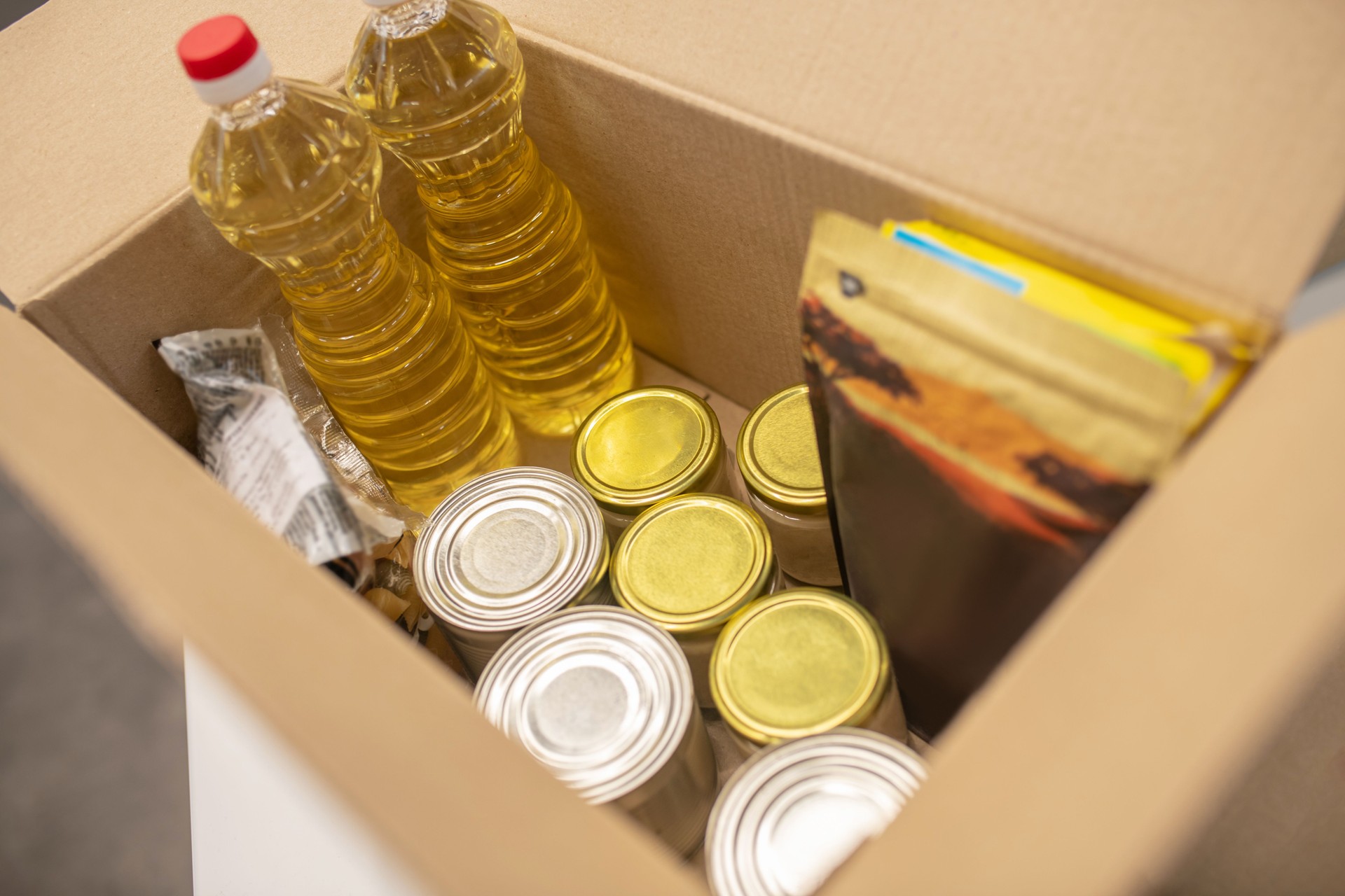 Food and clothing in an open donation box